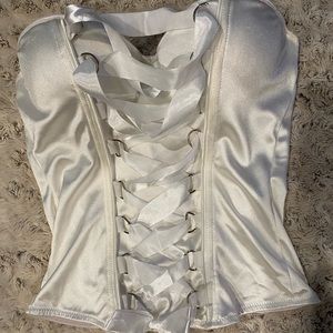White corset with silk ribbon cross down front
